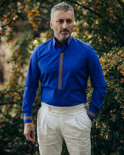 Men's casual blue shirt with traditional red-yellow embroidered motifs Merer