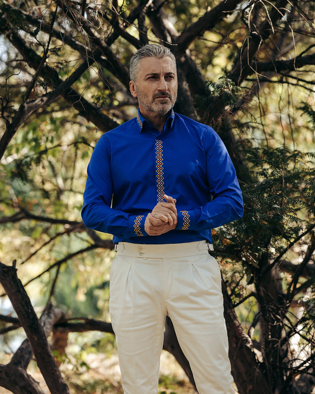 Men's casual blue shirt with traditional red-yellow embroidered motifs Merer