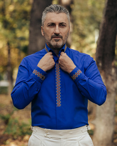 Men's casual blue shirt with traditional red-yellow embroidered motifs Merer