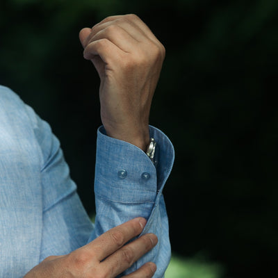 Blue IN shirt with partial slit and Merer logo