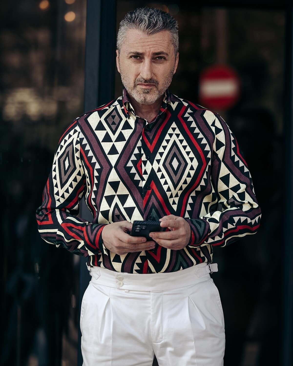 IN shirt with large tribal pattern