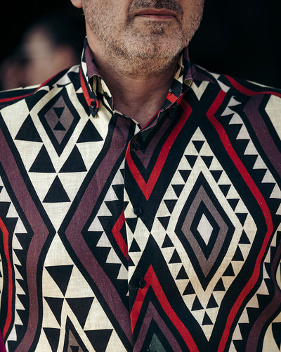 IN shirt with large tribal pattern