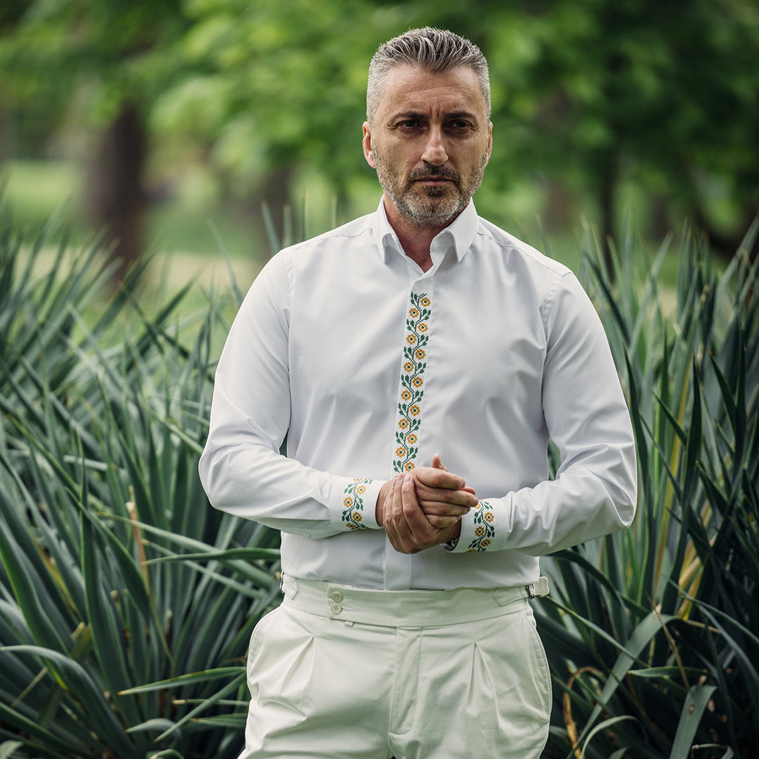 Men's casual white shirt with traditional motifs and green and orange embroidery Merer