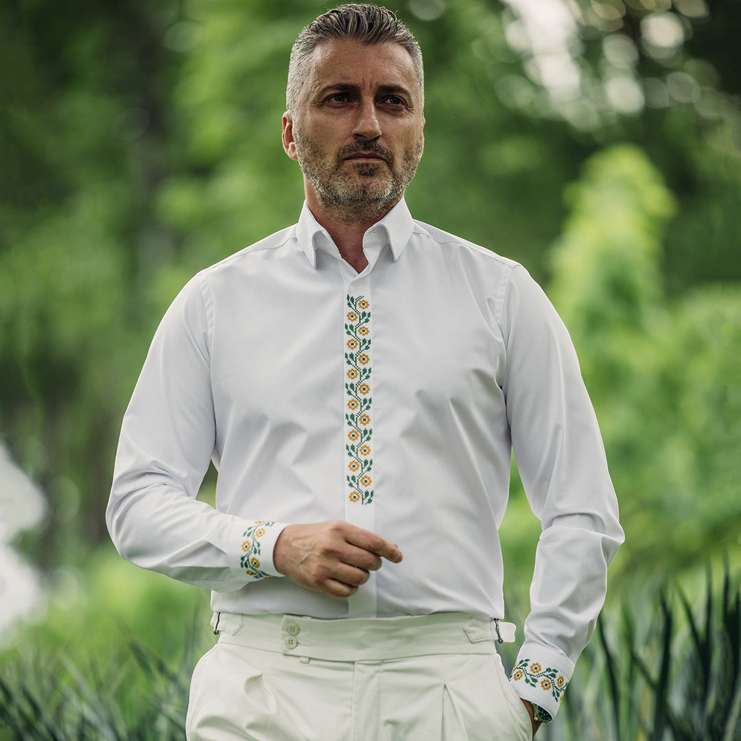 Men's casual white shirt with traditional motifs and green and orange embroidery Merer