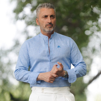 Blue IN shirt with partial slit and Merer logo