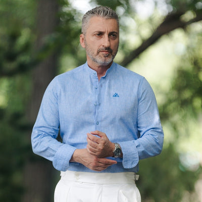 Blue IN shirt with partial slit and Merer logo