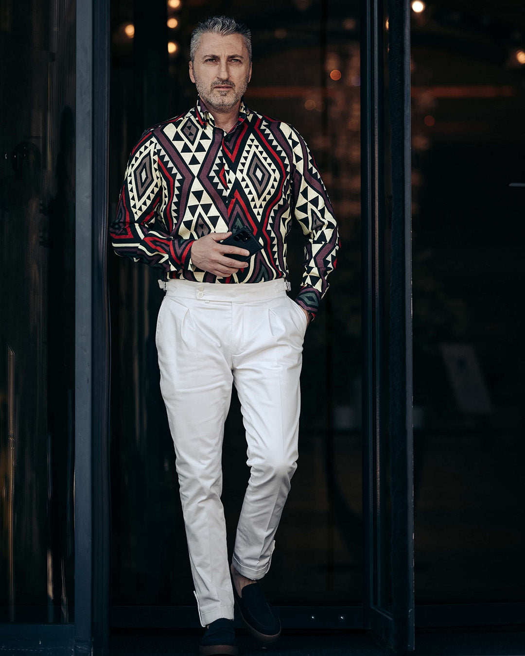 IN shirt with large tribal pattern